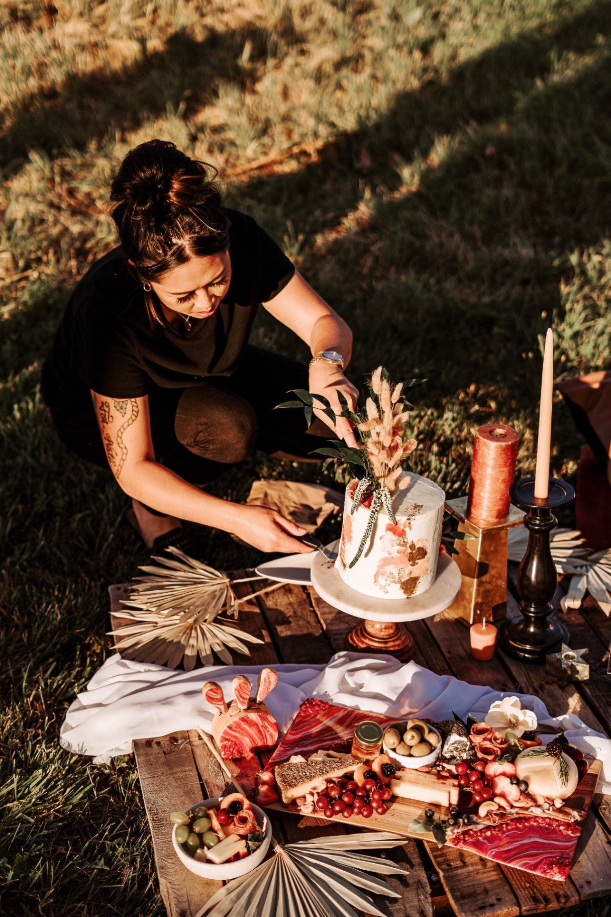 Outdoor styled shoot with custom cake and charcuterie spread